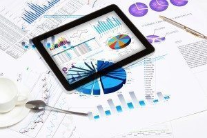 ipad tablet reports data and charts