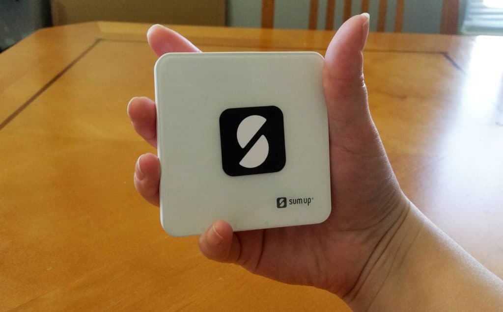 SumUp card reader in hand