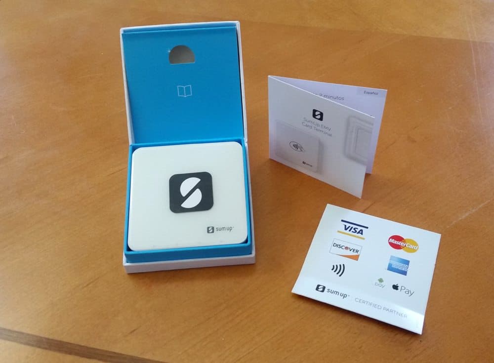 SumUp reader with manual and sticker sheet