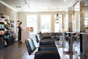 woman using a pos system at a salon