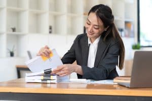 Woman reading long term contract.