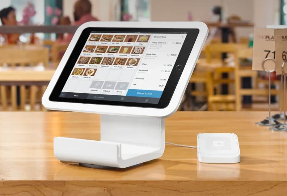 Square iPad stand and card reader on table