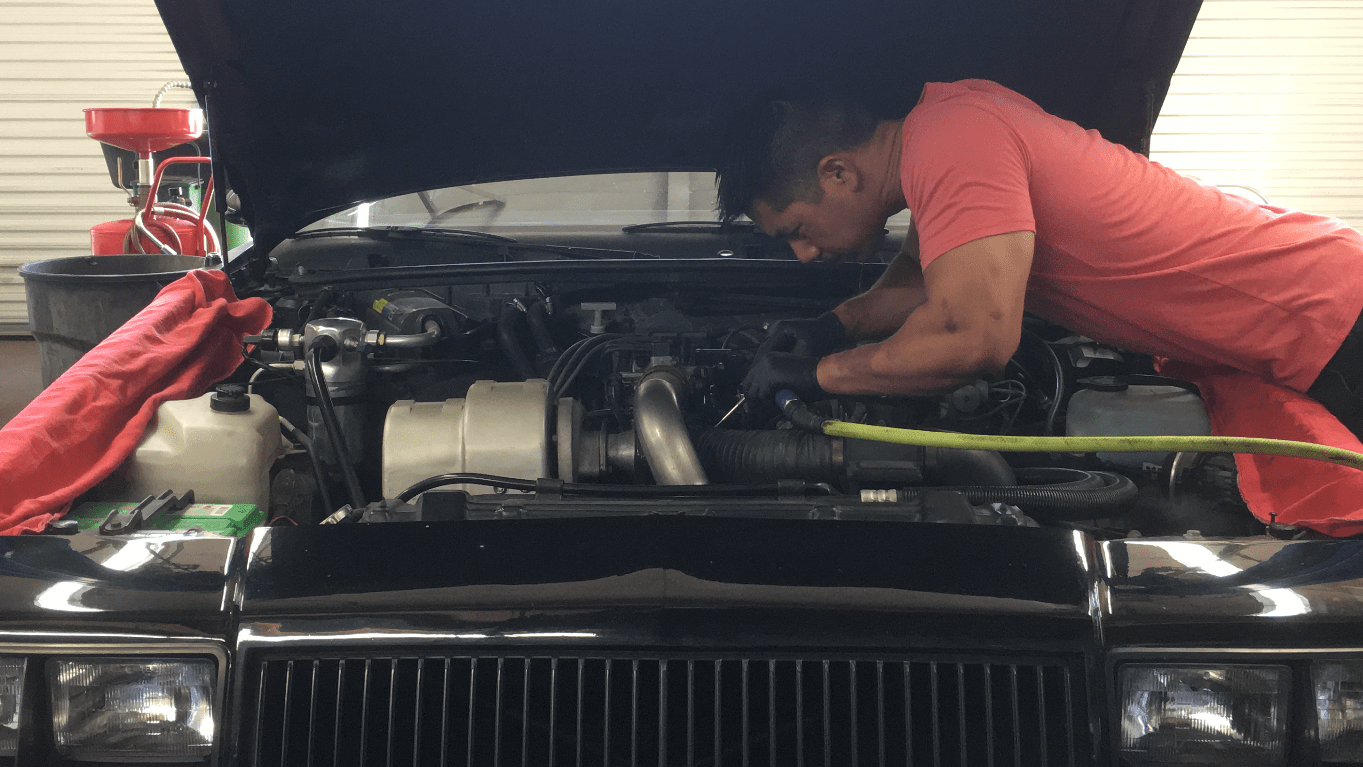 mechanic working on car