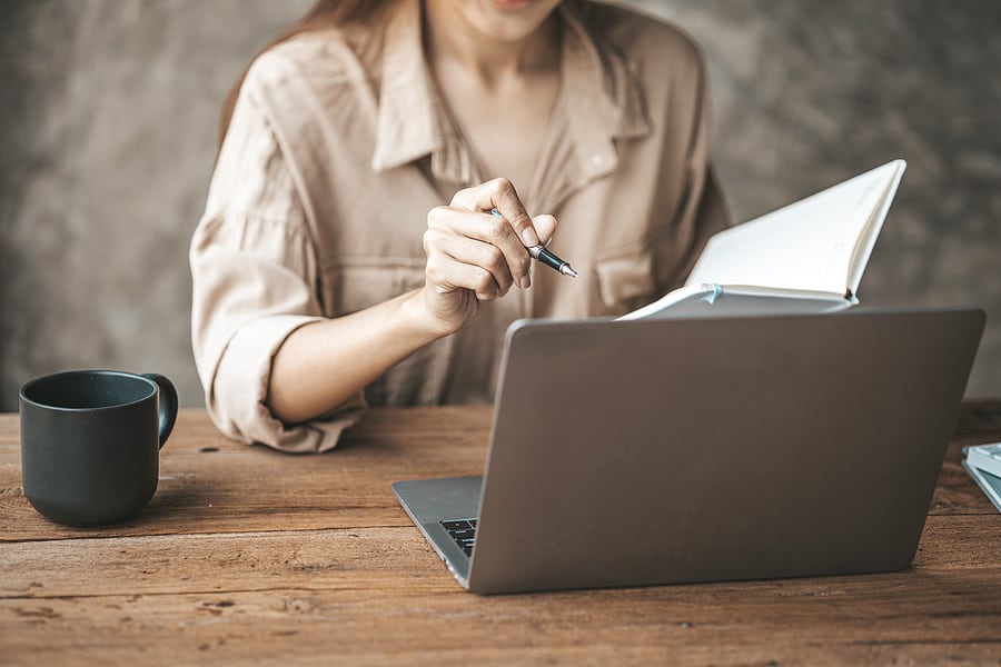 Young woman doing payroll