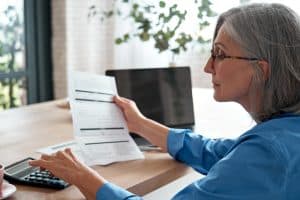 A woman is contemplating getting an ERC loan.