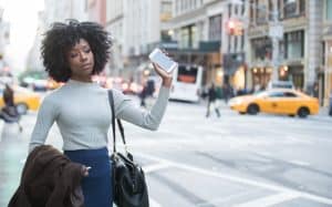 Woman using rideshare app